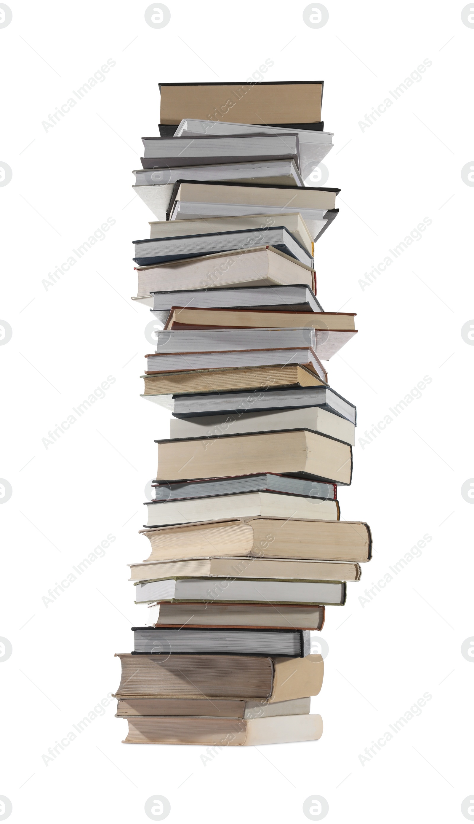 Photo of High stack of many different books isolated on white