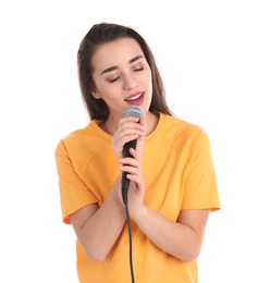 Photo of Young woman wearing casual clothes singing in microphone on white background