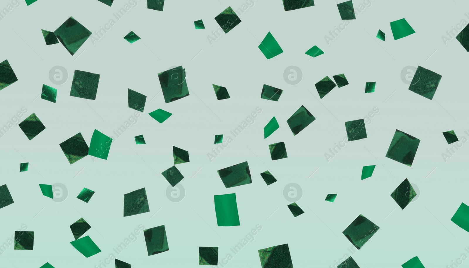 Image of Shiny green confetti falling on color background. Banner design