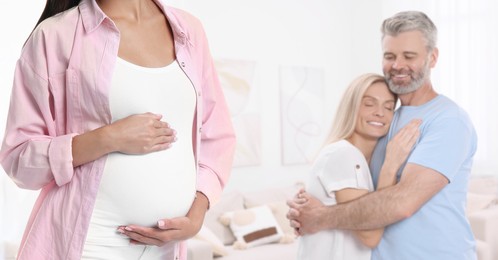 Image of Surrogate mother and intended parents indoors. Banner design