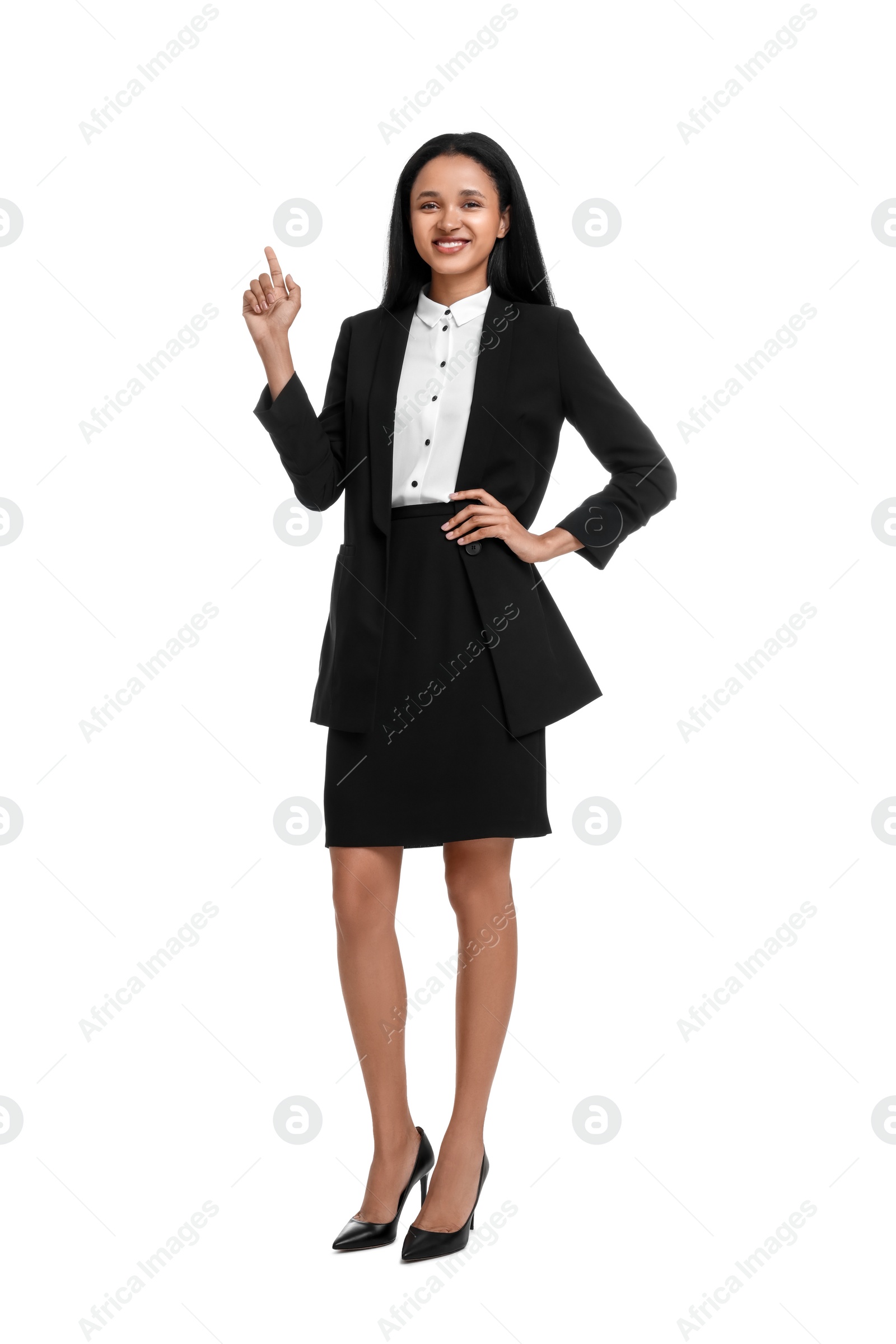 Photo of Portrait of beautiful secretary pointing upwards on white background