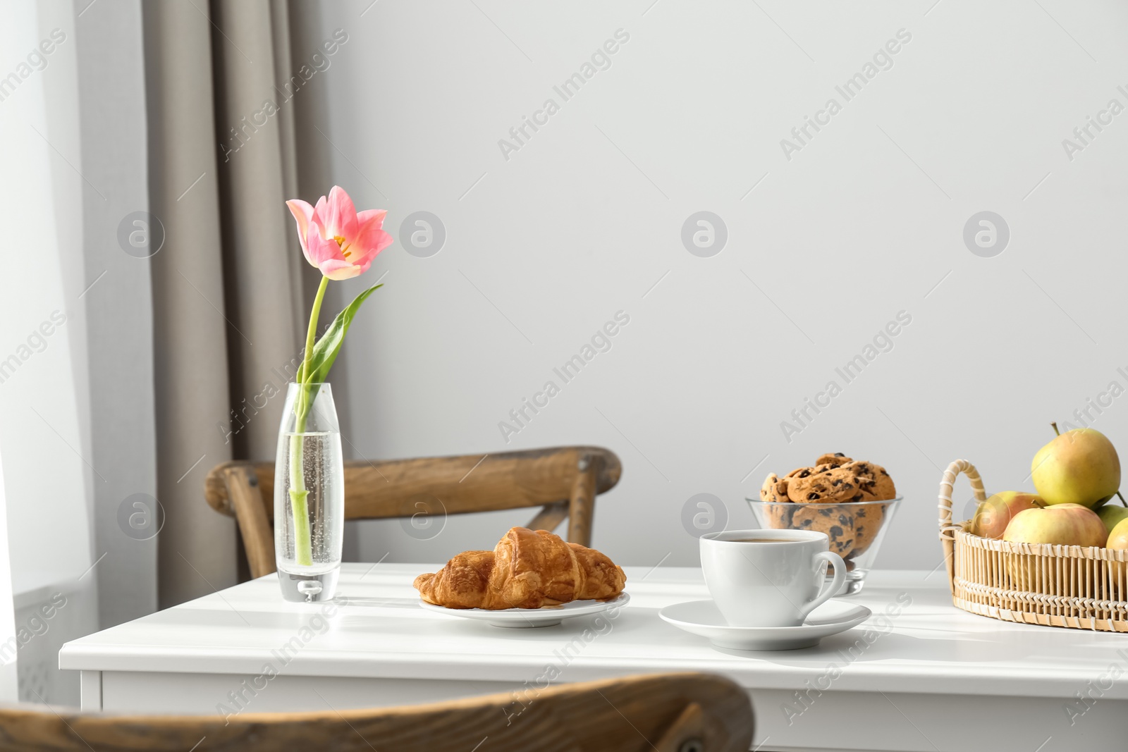 Photo of Tasty breakfast served on white table indoors