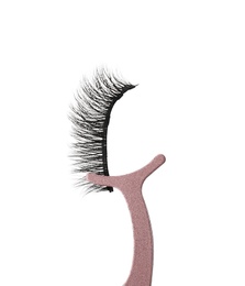 Photo of Tweezers with magnetic eyelashes on white background