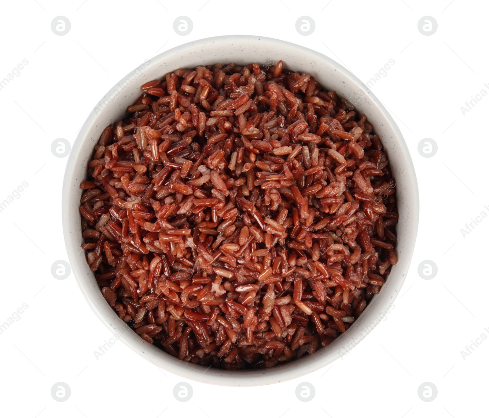 Photo of Bowl with delicious cooked brown rice on white background, top view