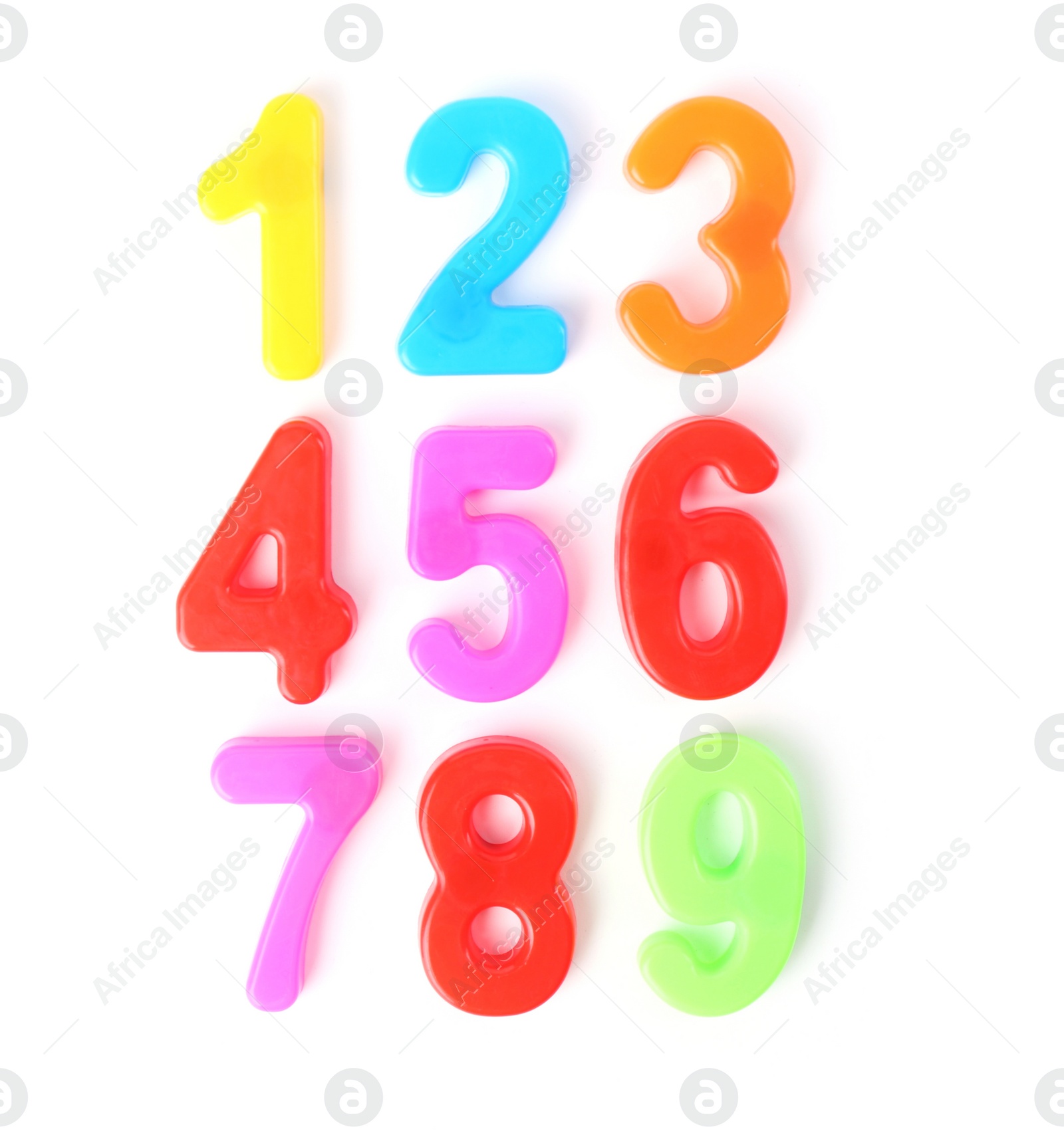 Photo of Colorful numbers on white background, top view