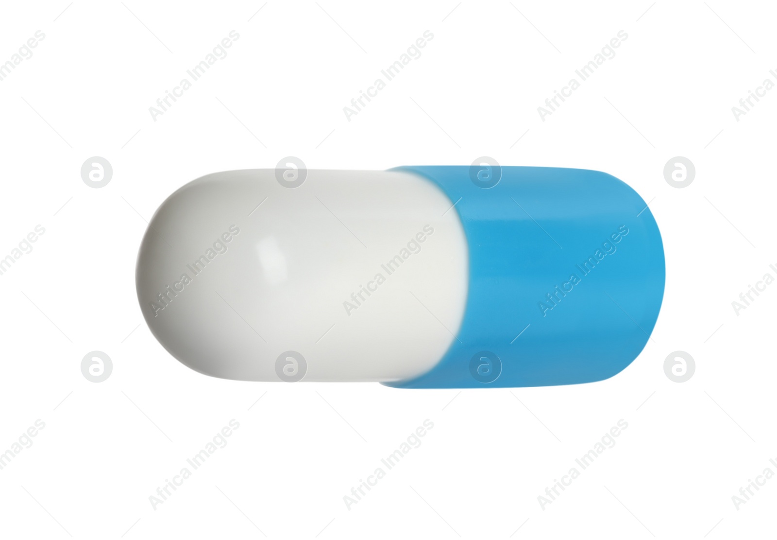 Photo of One pill isolated on white. Medicinal treatment