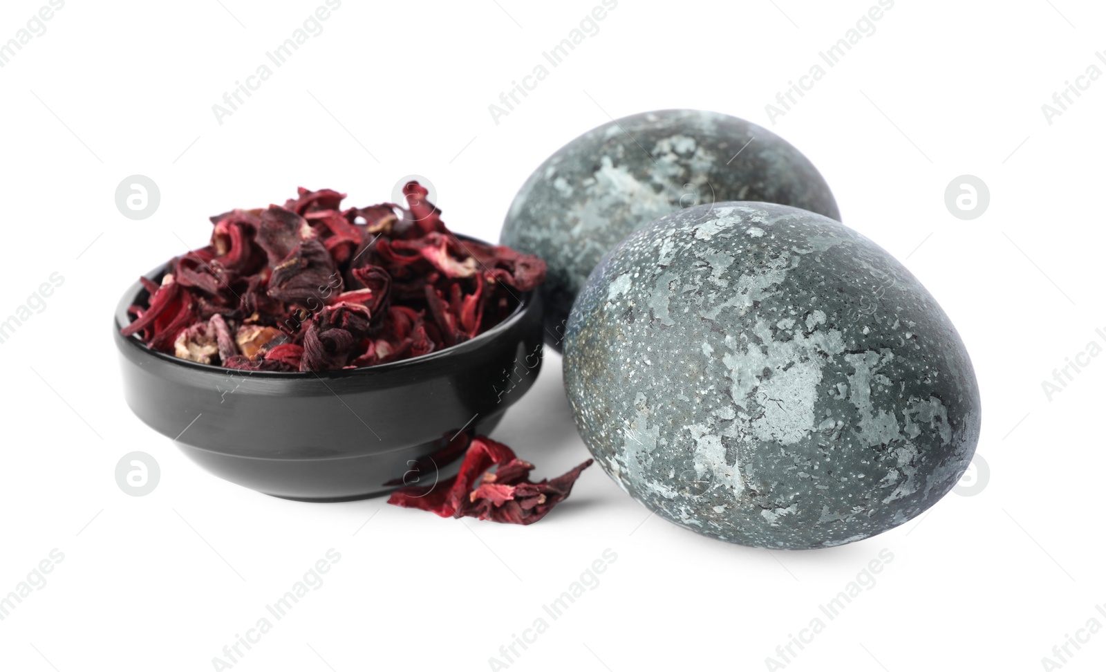 Photo of Naturally painted Easter eggs on white background,. Hibiscus used for coloring