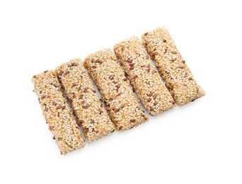 Photo of Tasty sesame seed bars isolated on white