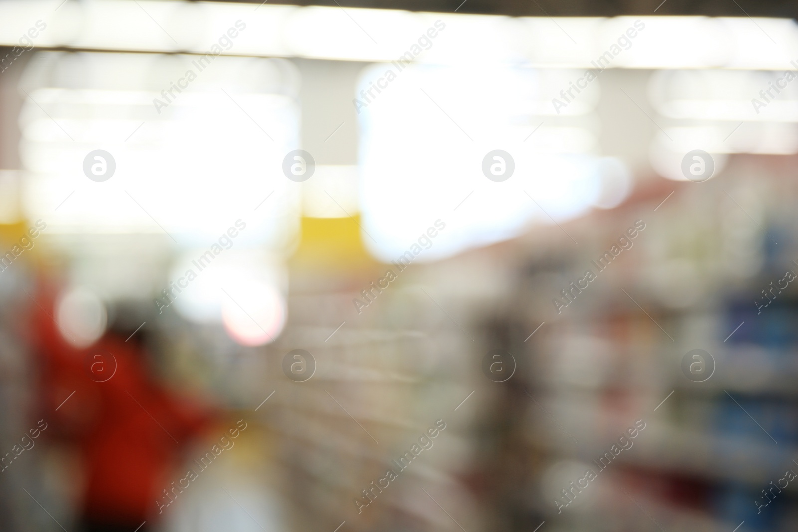 Photo of Blurred view of modern supermarket interior