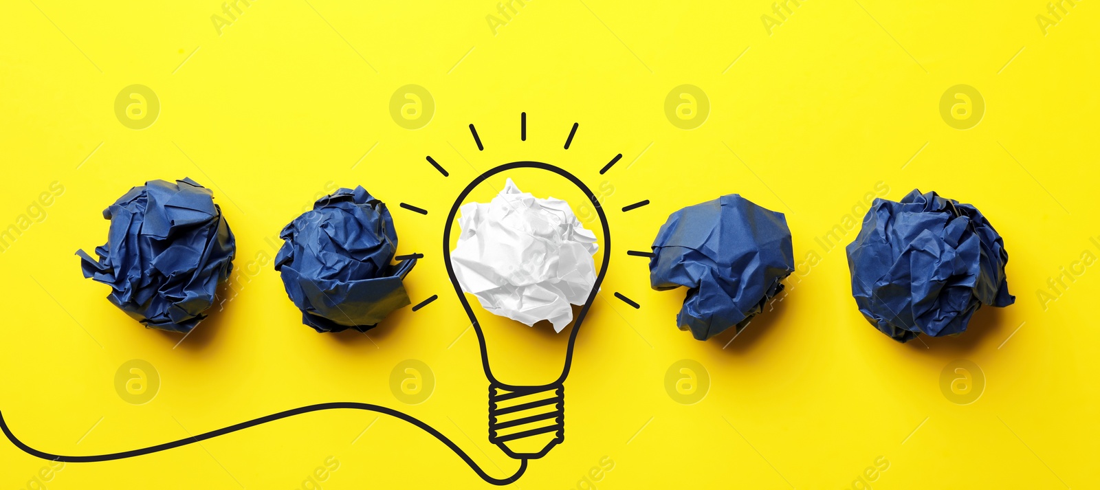 Image of Idea. Illustration of light bulb around crumpled paper ball on yellow background, flat lay. Banner design