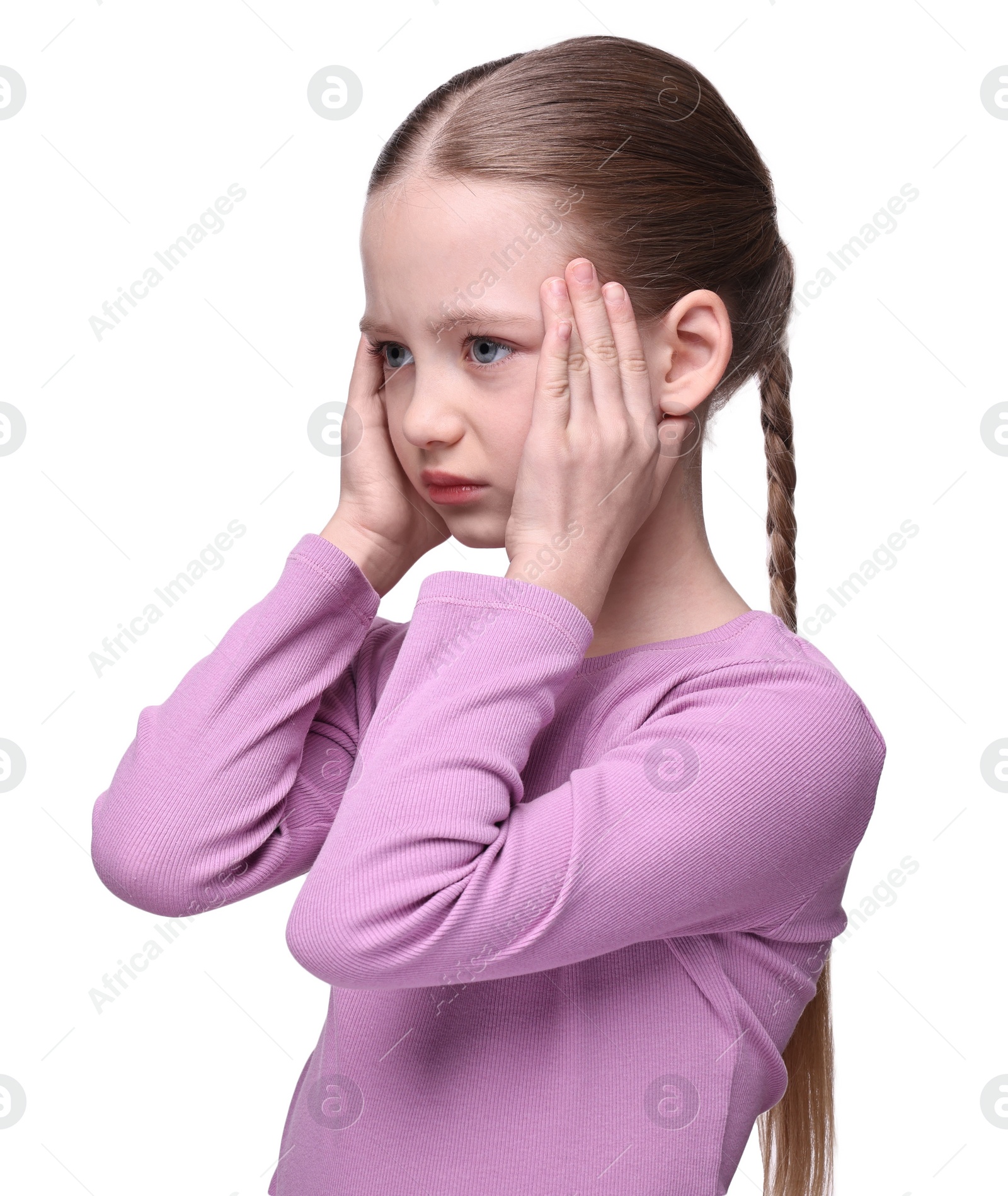 Photo of Little girl suffering from headache on white background