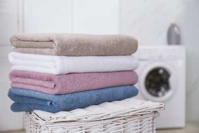 Stack of fresh towels in laundry room