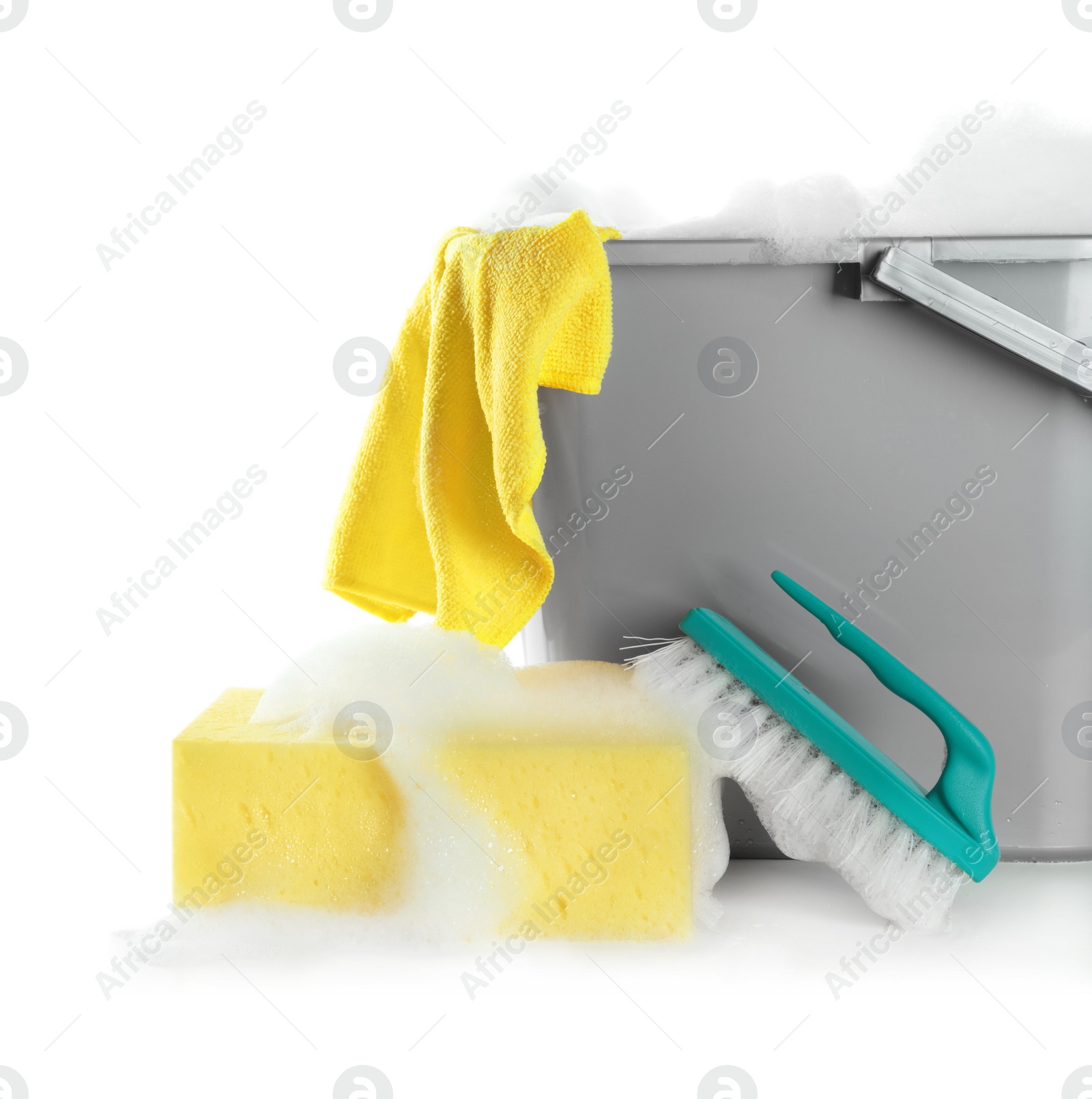 Photo of Plastic bucket with foam and sponge on white background. Cleaning supplies