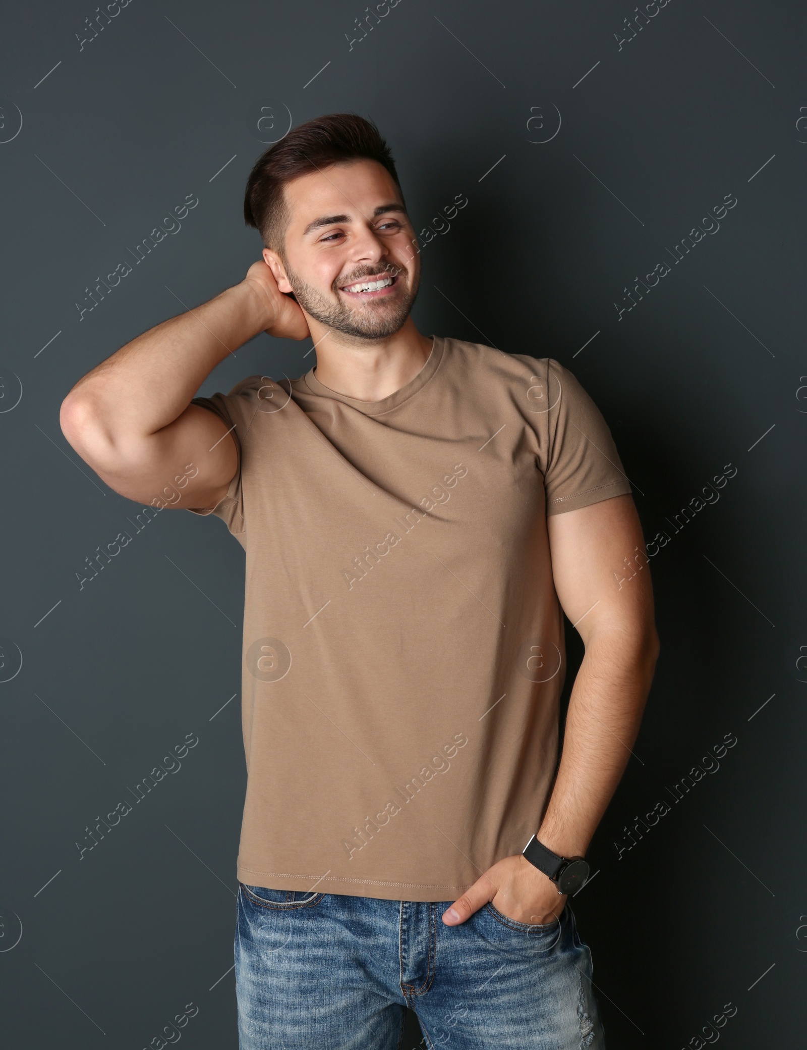 Photo of Portrait of handsome man on dark background