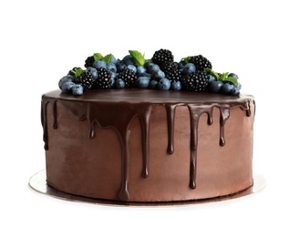 Photo of Fresh delicious homemade chocolate cake with berries on white background