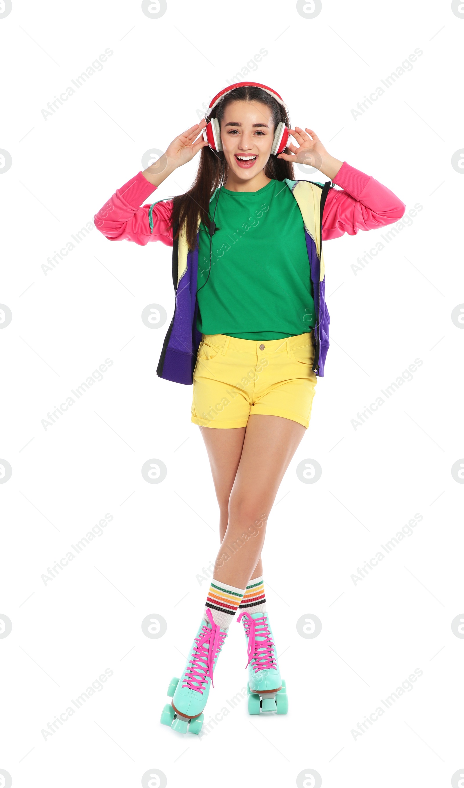 Photo of Full length portrait of young woman with roller skates on white background