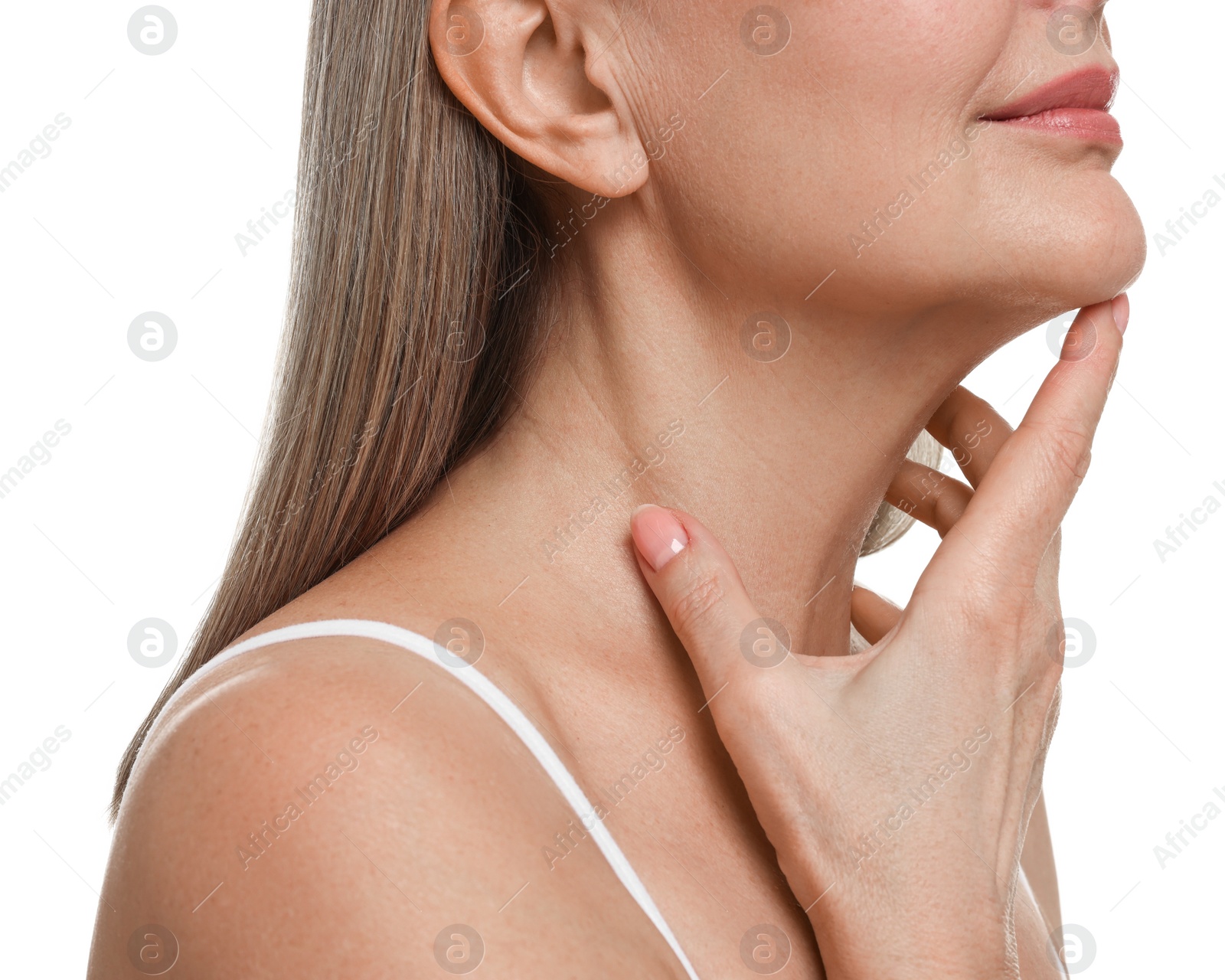 Photo of Mature woman touching her neck on white background, closeup