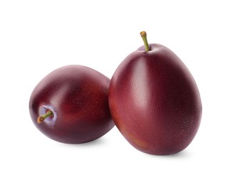 Photo of Delicious fresh ripe plums on white background