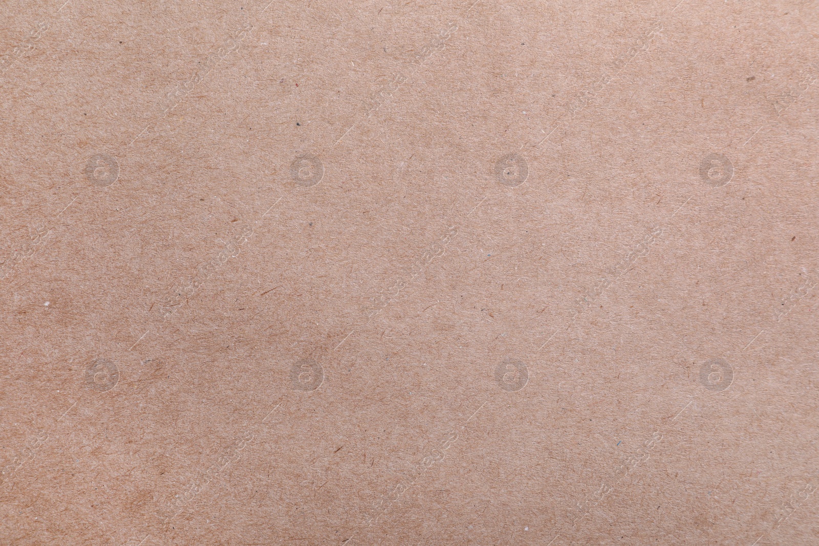 Photo of Texture of kraft paper bag as background, closeup