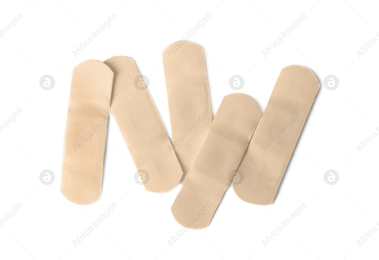 Medical sticking plasters isolated on white. First aid item Photo of Medical sticking plasters isolated on white. First aid item
