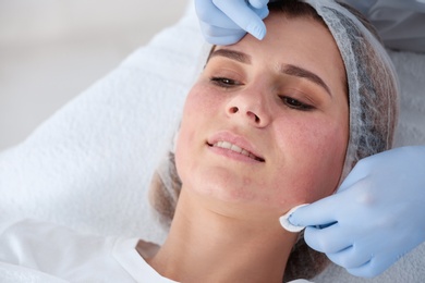 Photo of Woman undergoing face biorevitalization procedure in salon, closeup. Cosmetic treatment