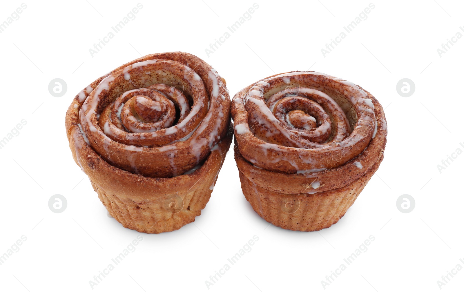 Photo of Two tasty cinnamon rolls isolated on white