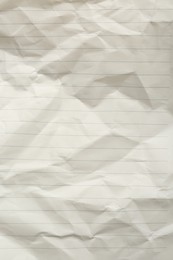 Photo of Crumpled lined notebook sheet as background, top view