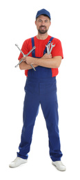 Photo of Full length portrait of professional auto mechanic with wrenches on white background