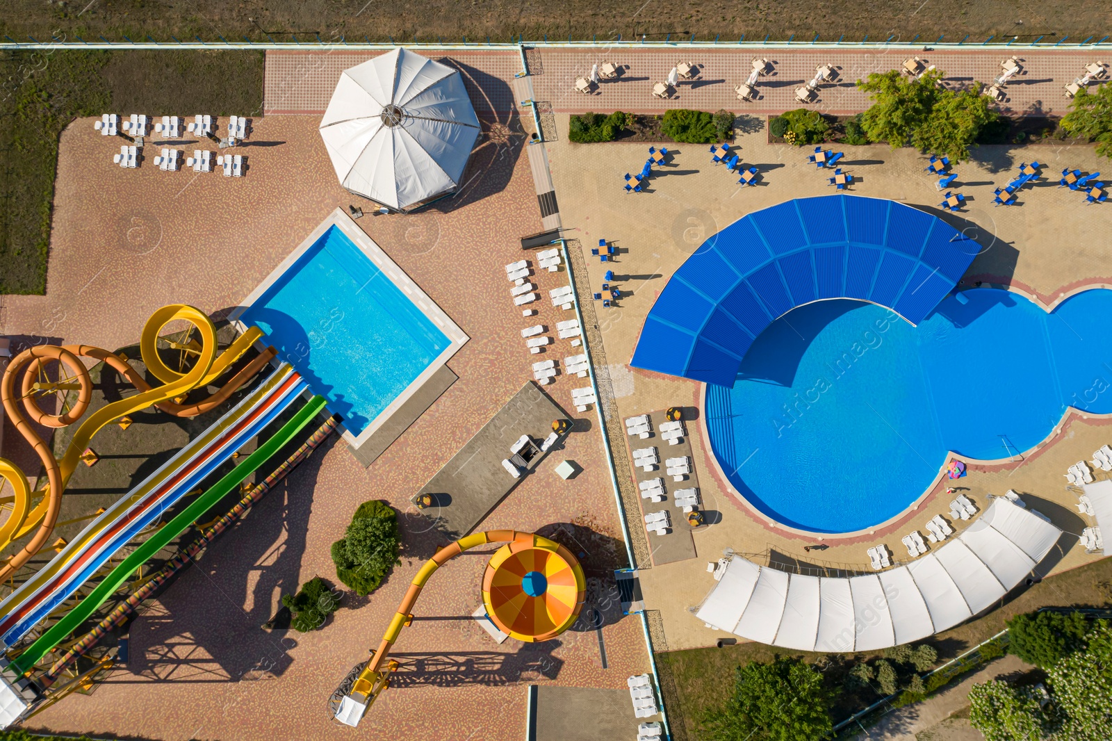 Image of Aerial view of water park on sunny day