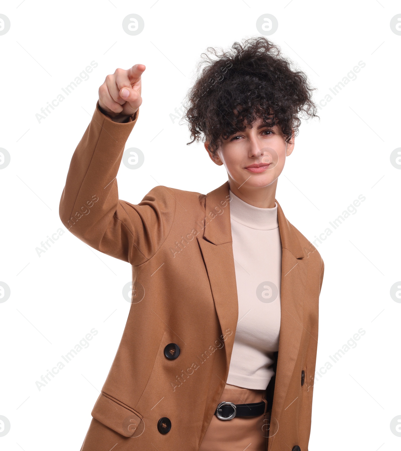 Photo of Beautiful businesswoman pointing at something on white background