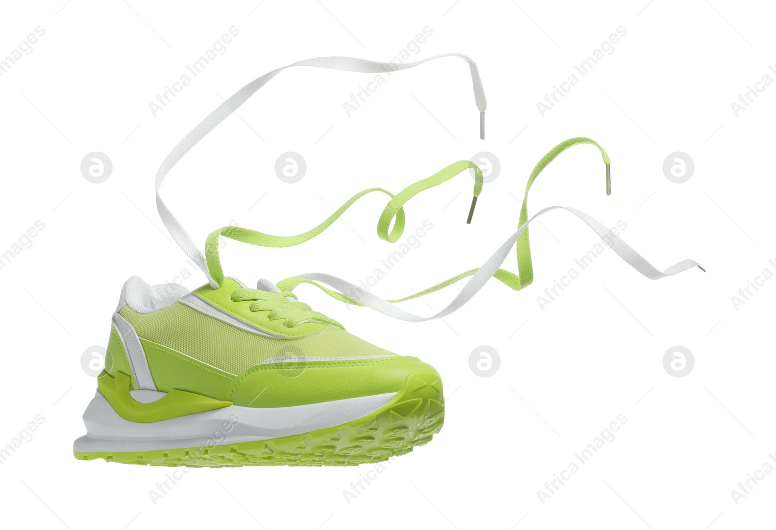 Photo of One stylish light green sneaker isolated on white