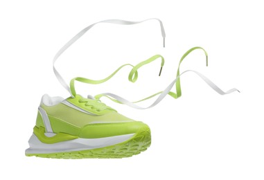 One stylish light green sneaker isolated on white