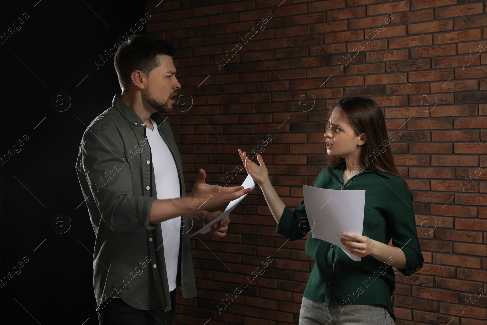 Photo of Professional actors rehearsing on stage in theatre