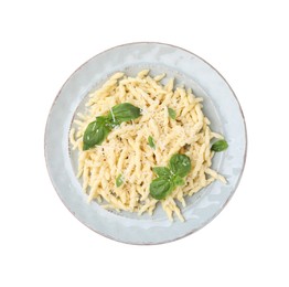 Plate of delicious trofie pasta with cheese and basil leaves isolated on white, top view