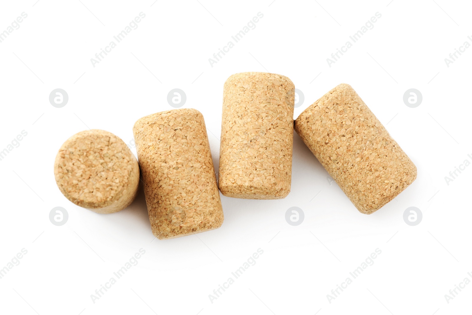 Photo of Set of wine bottle corks isolated on white, top view