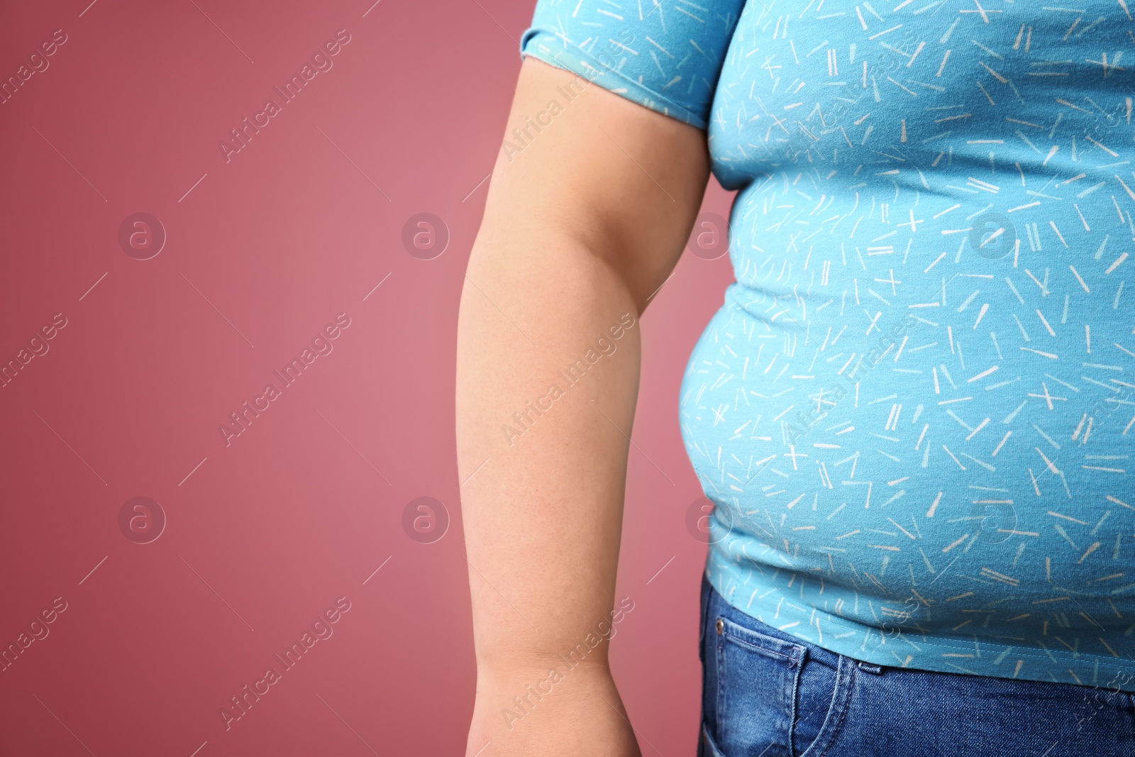 Photo of Overweight woman on color background