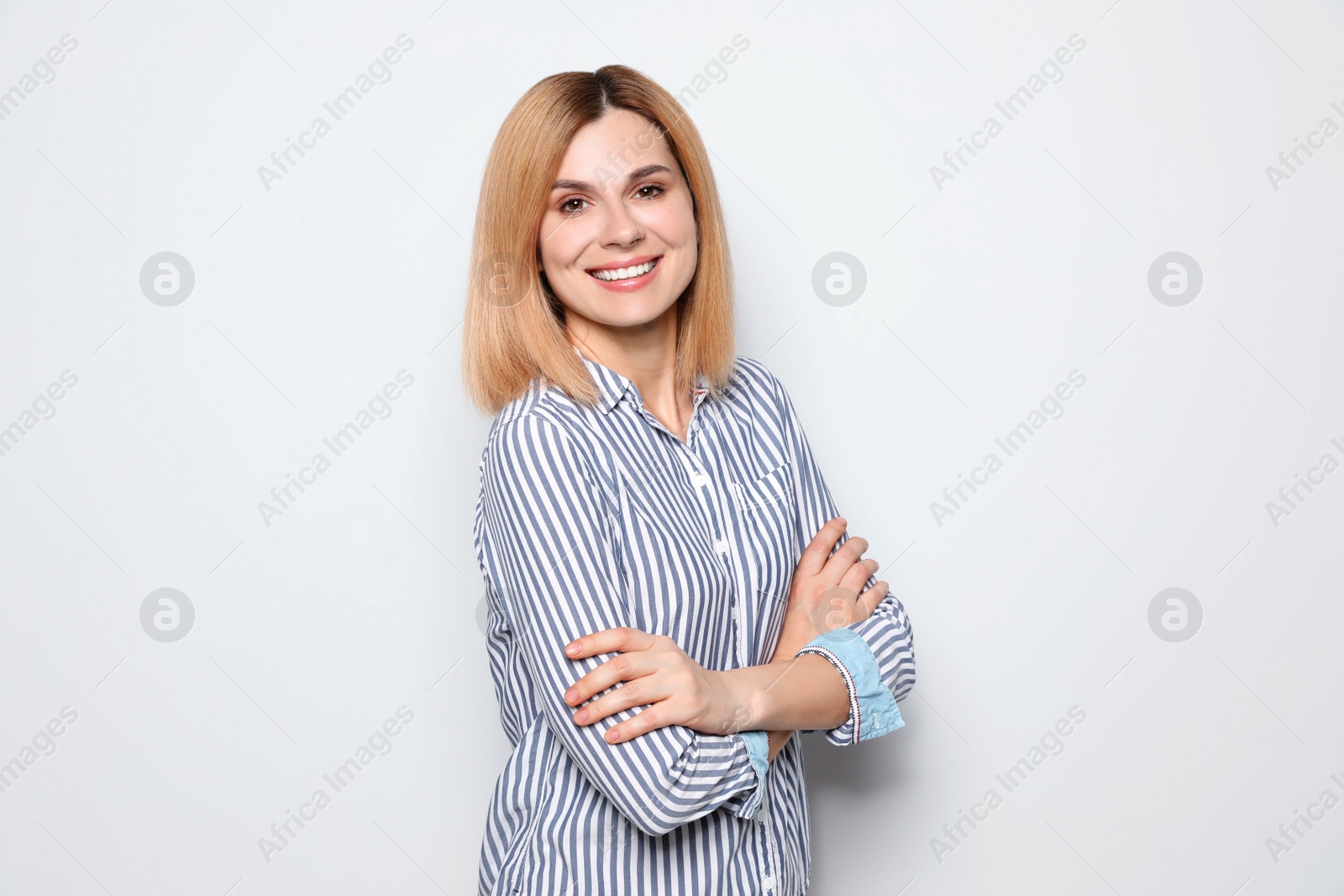 Photo of Portrait of woman with beautiful face on white background