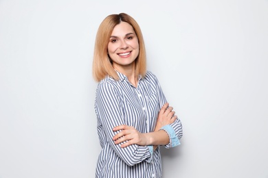 Photo of Portrait of woman with beautiful face on white background