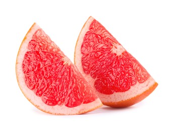 Photo of Cut ripe grapefruit isolated on white. Citrus fruit