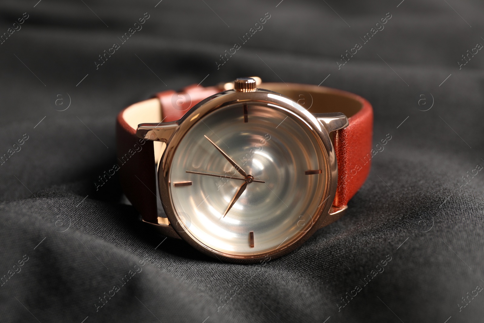 Photo of Luxury wrist watch on black background, closeup