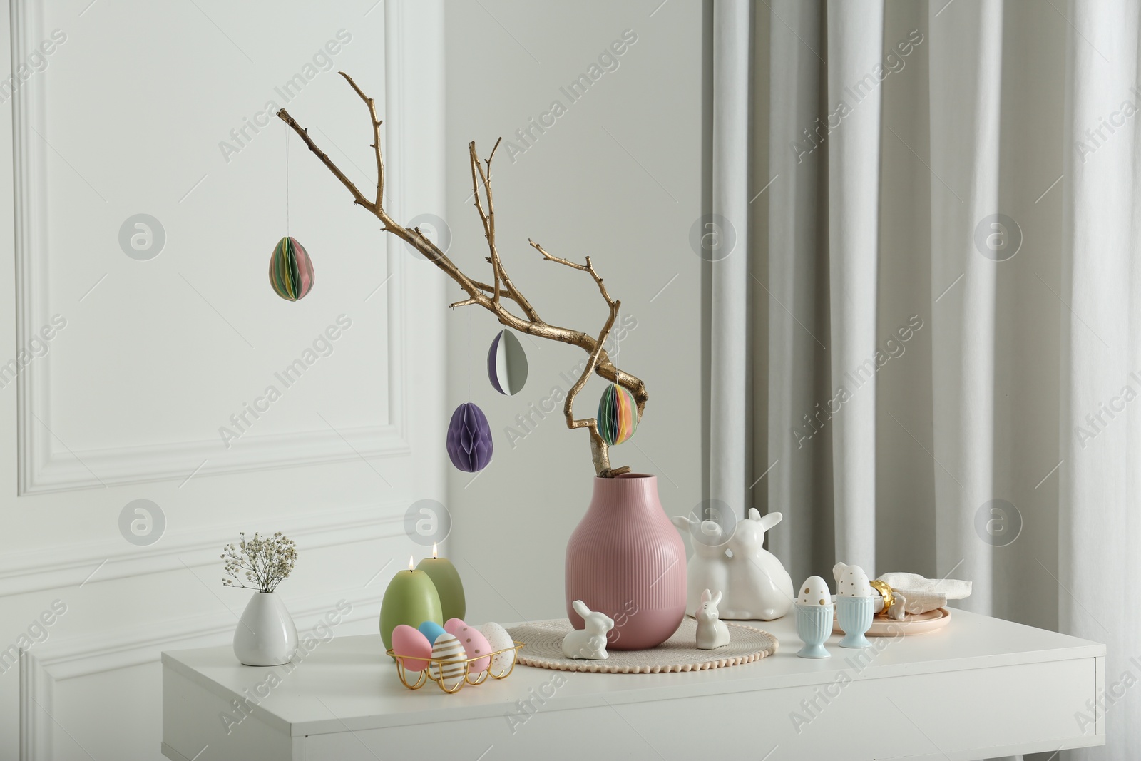 Photo of Beautiful festive composition with Easter decor on white table indoors