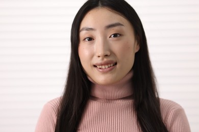 Portrait of smiling confident businesswoman in office