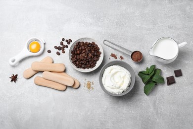 Flat lay composition with ingredients for tiramisu on grey table