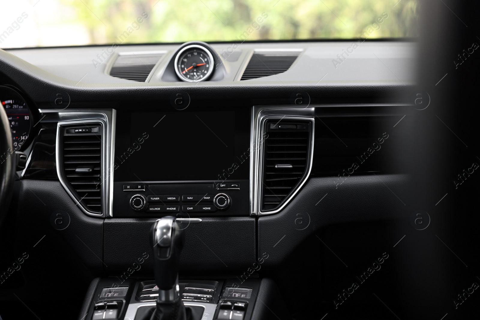 Photo of Modern navigation system with screen in car