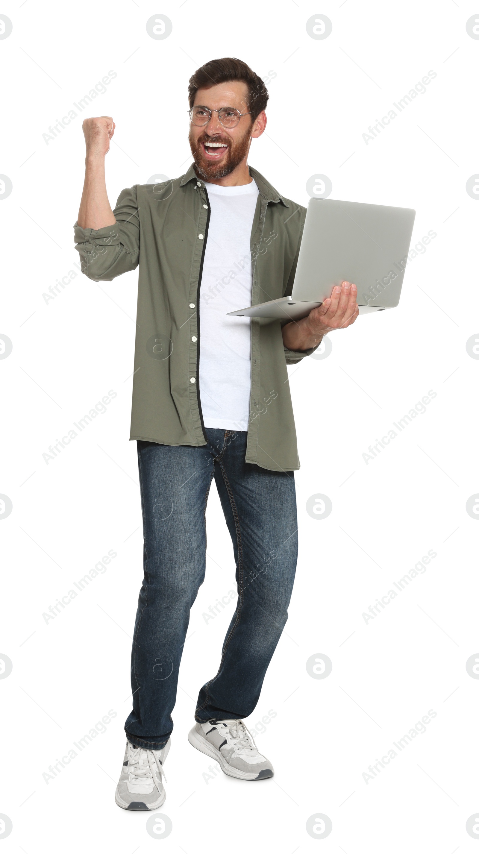 Photo of Happy handsome man with laptop on white background