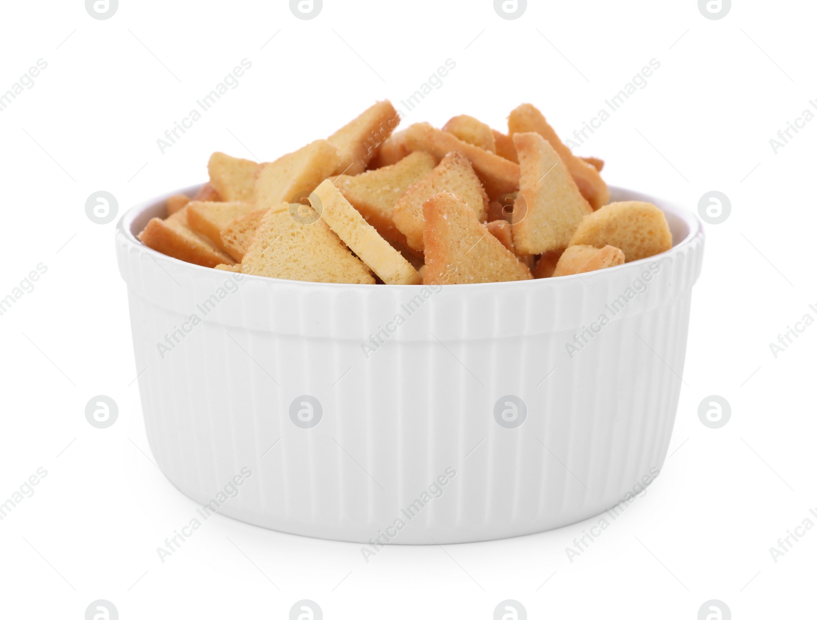 Photo of Delicious crispy rusks in bowl on white background