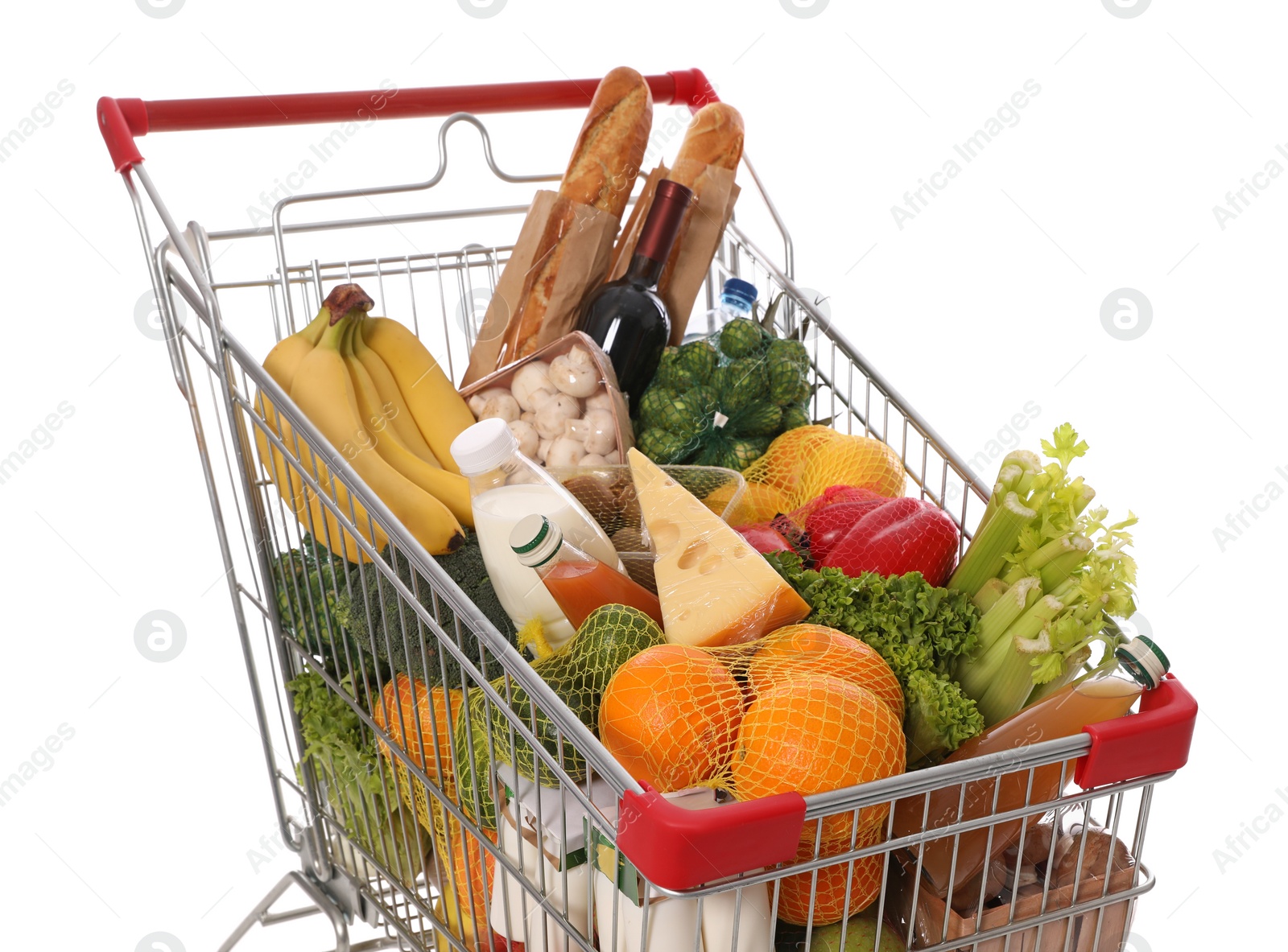 Photo of Shopping cart full of groceries on white background