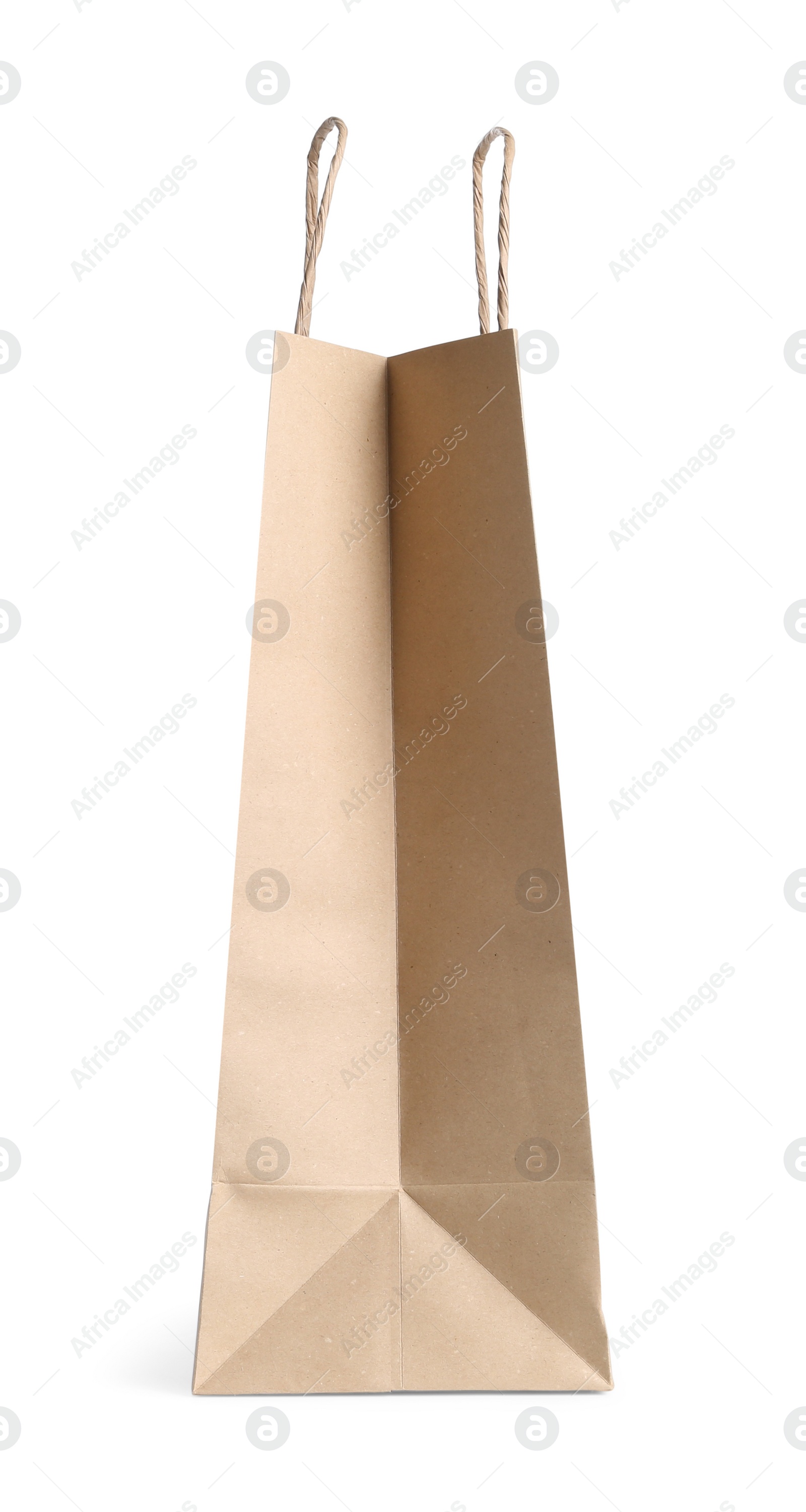 Photo of One kraft paper bag isolated on white. Mockup for design