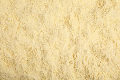 Photo of Pile of corn flour as background, top view