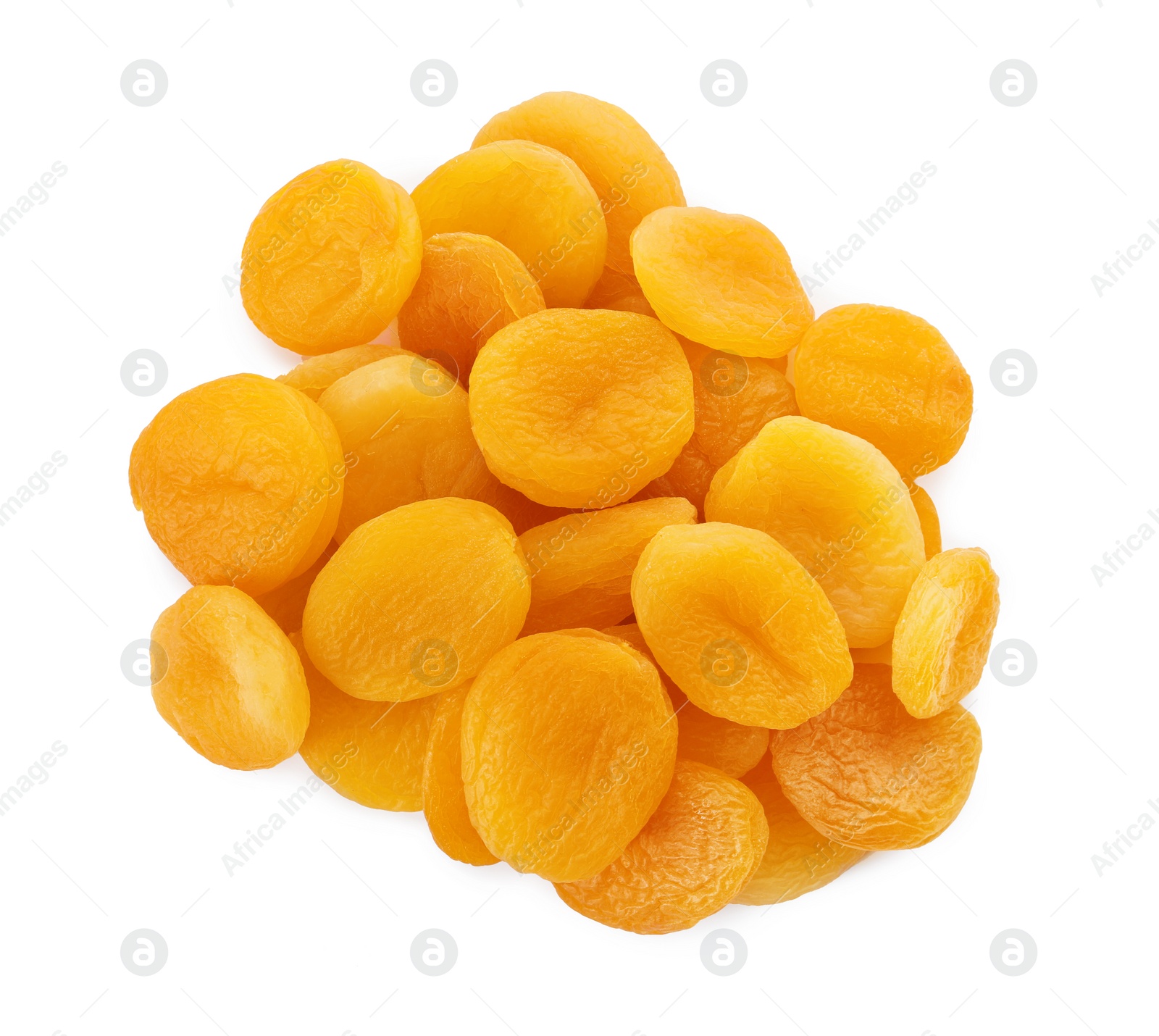 Photo of Pile of tasty apricots on white background, top view. Dried fruits